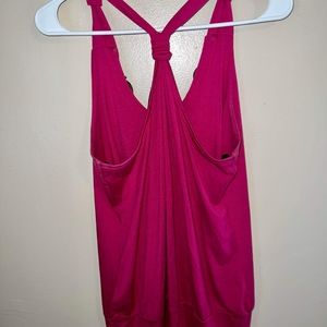 Boho meets Racerback Chic in this deep fuchsia top with light chunky wood bead
